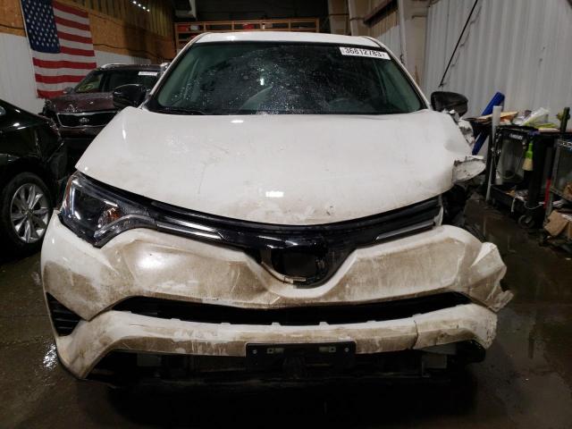 Photo 5 from auction – 2018 TOYOTA RAV4 LE with VIN 2T3BFREV1JW768552
