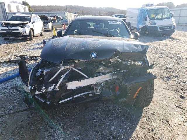Photo 5 from auction – 2021 BMW 330I with VIN 3MW5R1J00M8B82808