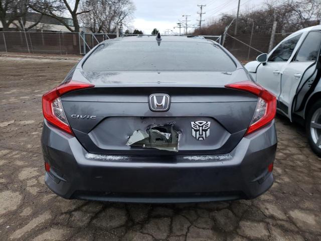 Photo 6 from auction – 2018 HONDA CIVIC EX with VIN 19XFC2F74JE009133