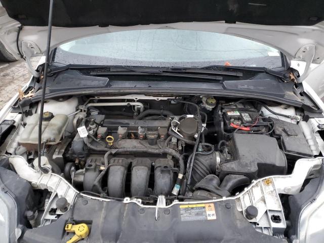 Photo 11 from auction – 2014 FORD FOCUS TITA with VIN 1FADP3J23EL233395