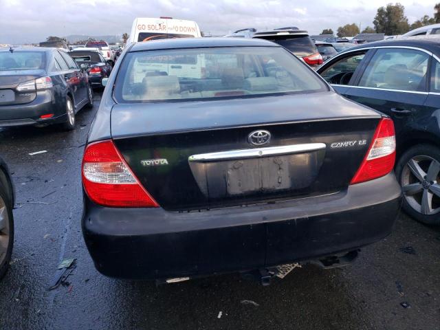 Photo 6 from auction – 2002 TOYOTA CAMRY LE with VIN JTDBE32K920111174