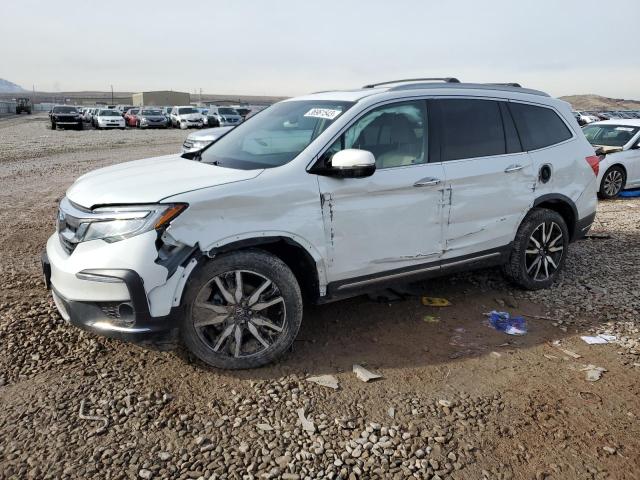HONDA PILOT TOUR 2020 with VIN 5FNYF6H92LB053389 - Photo from auction