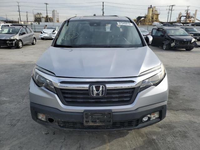 Photo 5 from auction – 2018 HONDA RIDGELINE with VIN 5FPYK3F74JB011628