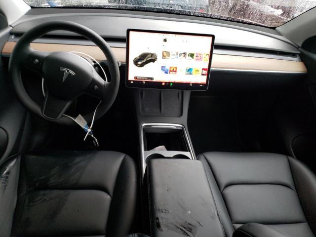 Photo 8 from auction – 2022 TESLA MODEL Y with VIN 7SAYGAEE2NF351884