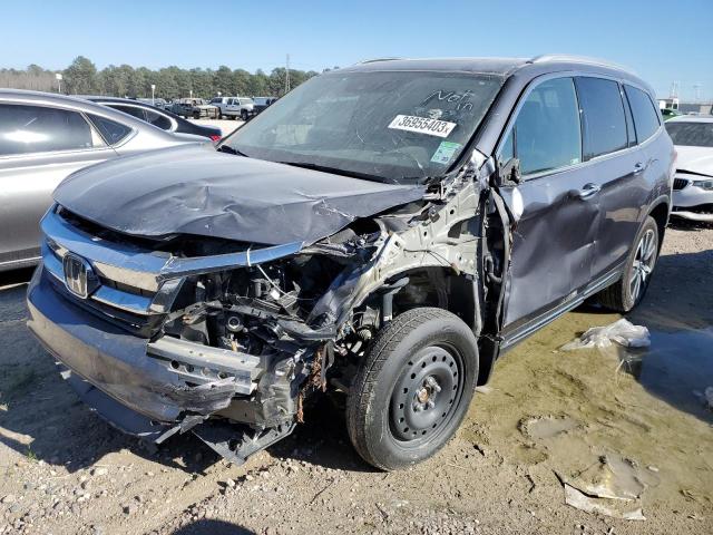 Photo 1 from auction – 2021 HONDA PILOT ELIT with VIN 5FNYF6H00MB086734