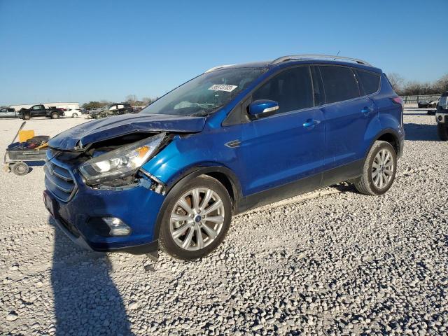 FORD ESCAPE TIT 2017 with VIN 1FMCU0J94HUC14603 - Photo from auction