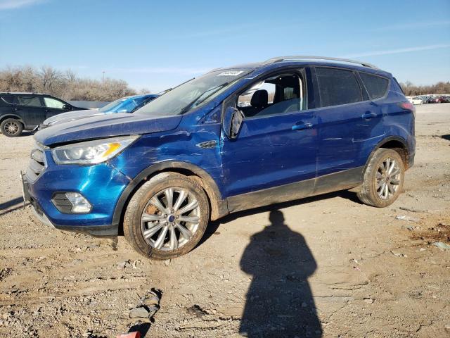 FORD ESCAPE TIT 2017 with VIN 1FMCU9J90HUB38091 - Photo from auction