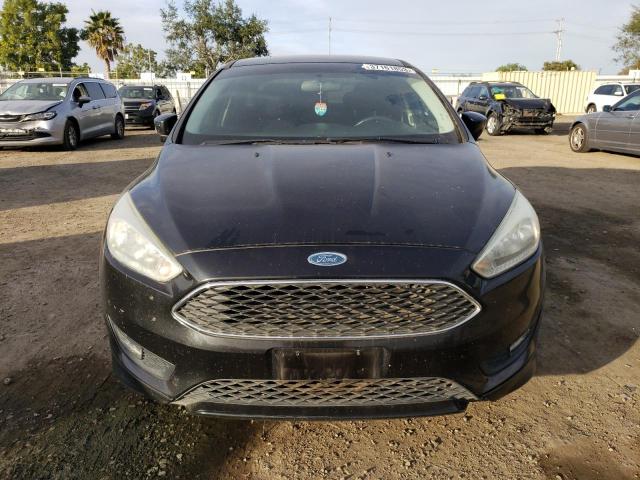 Photo 5 from auction – 2015 FORD FOCUS SE with VIN 1FADP3FE7FL328403