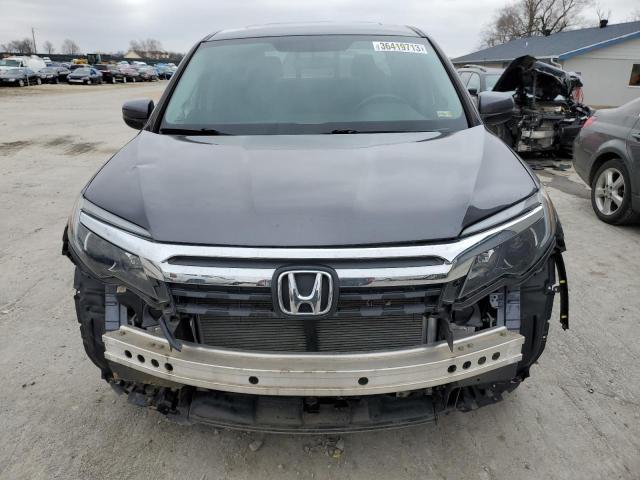 Photo 5 from auction – 2019 HONDA RIDGELINE with VIN 5FPYK3F52KB017461