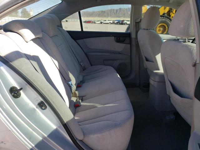 Photo 10 from auction – 2006 KIA OPTIMA LX with VIN KNAGE123565049507