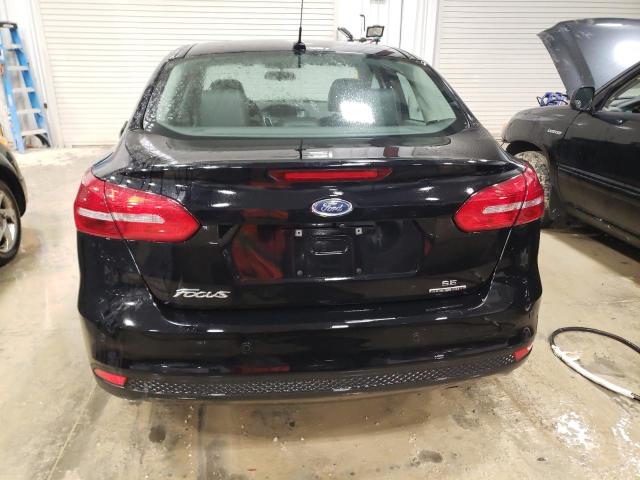 Photo 6 from auction – 2016 FORD FOCUS SE with VIN 1FADP3F20GL357913