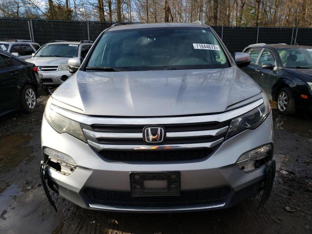Photo 5 from auction – 2018 HONDA PILOT TOUR with VIN 5FNYF6H97JB013080