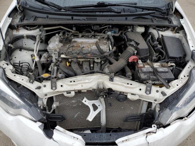 Photo 11 from auction – 2014 TOYOTA COROLLA L with VIN 2T1BURHE5EC121914