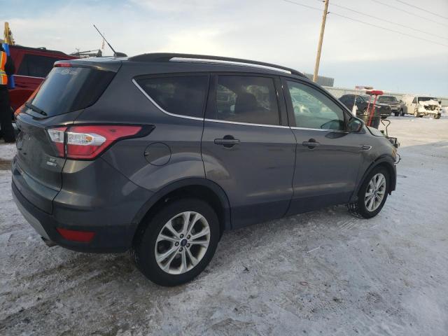 Photo 3 from auction – 2017 FORD ESCAPE SE with VIN 1FMCU9GD7HUC94351