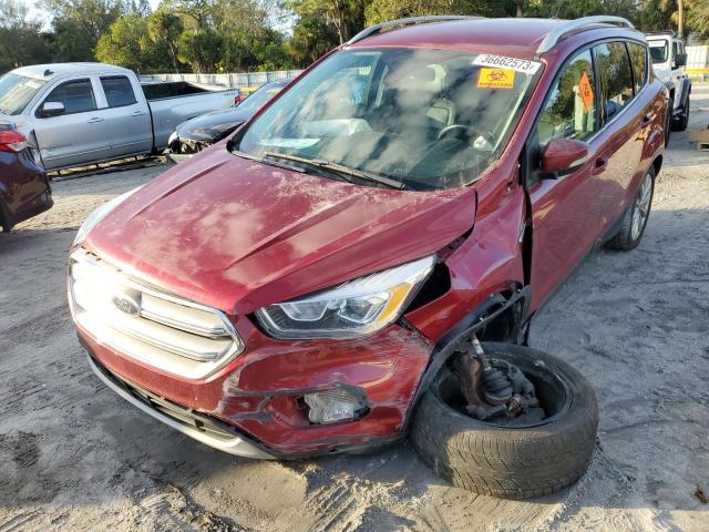 FORD ESCAPE TIT 2017 with VIN 1FMCU0JD4HUC93114 - Photo from auction