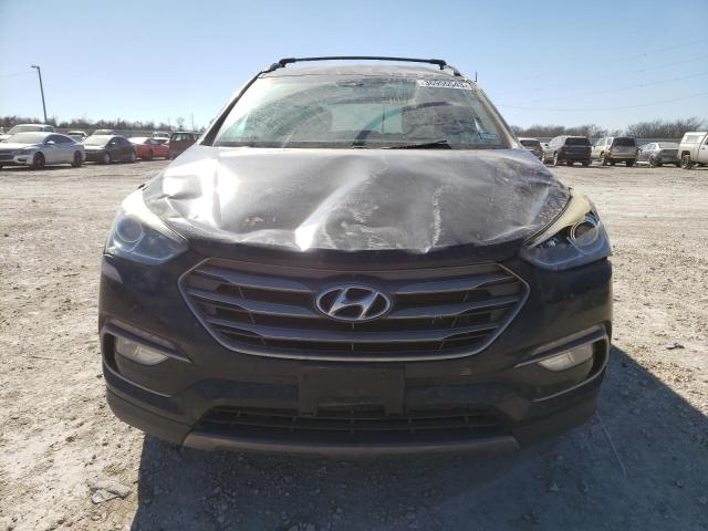 Photo 5 from auction – 2017 HYUNDAI SANTA FE S with VIN 5NMZU3LB4HH012027