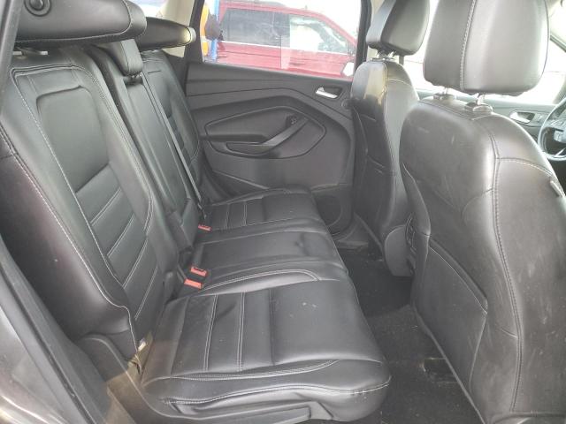 Photo 11 from auction – 2017 FORD ESCAPE SE with VIN 1FMCU9GD7HUC94351