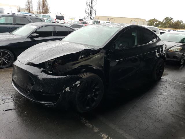 TESLA MODEL Y 2022 with VIN 7SAYGAEE2NF351884 - Photo from auction