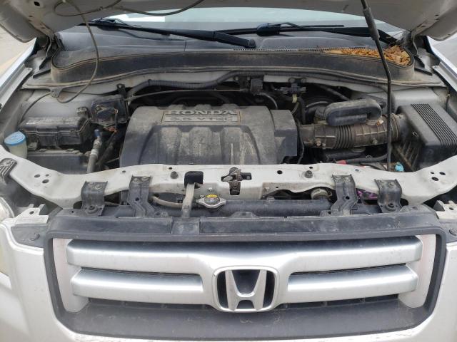 Photo 11 from auction – 2006 HONDA PILOT EX with VIN 2HKYF18616H550304