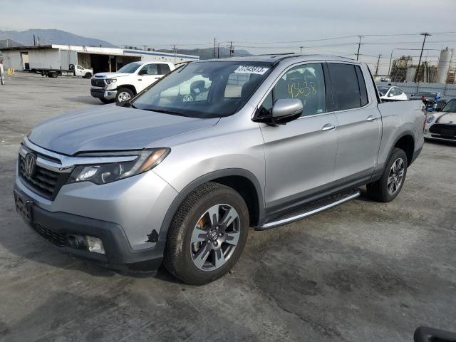 HONDA RIDGELINE 2018 with VIN 5FPYK3F74JB011628 - Photo from auction