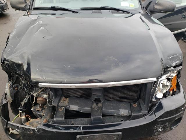 Photo 11 from auction – 2006 GMC ENVOY with VIN 1GKDT13S462114063