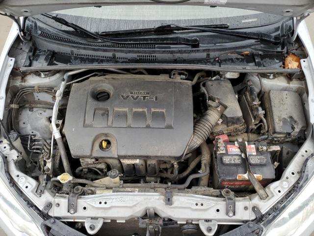 Photo 11 from auction – 2014 TOYOTA COROLLA L with VIN 2T1BURHE8EC097205