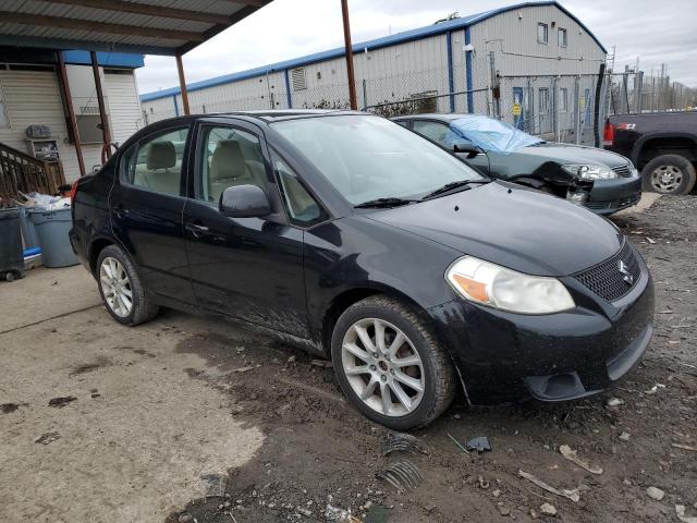 Photo 4 from auction – 2011 SUZUKI SX4 LE with VIN JS2YC5A22B6304797