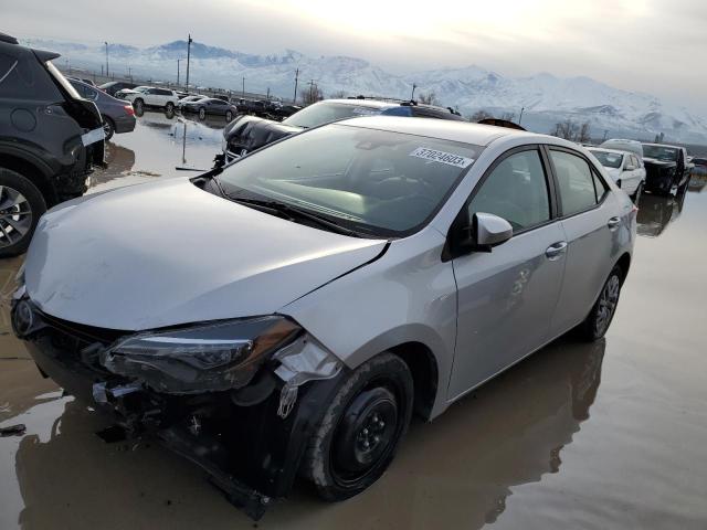 TOYOTA COROLLA L 2017 with VIN 5YFBURHE3HP696047 - Photo from auction