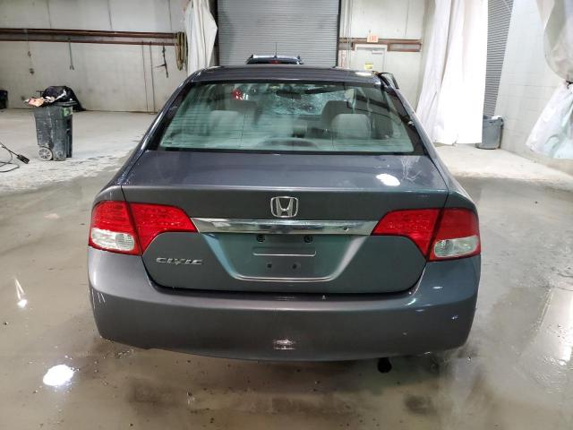 Photo 6 from auction – 2011 HONDA CIVIC LX with VIN 19XFA1F52BE034838