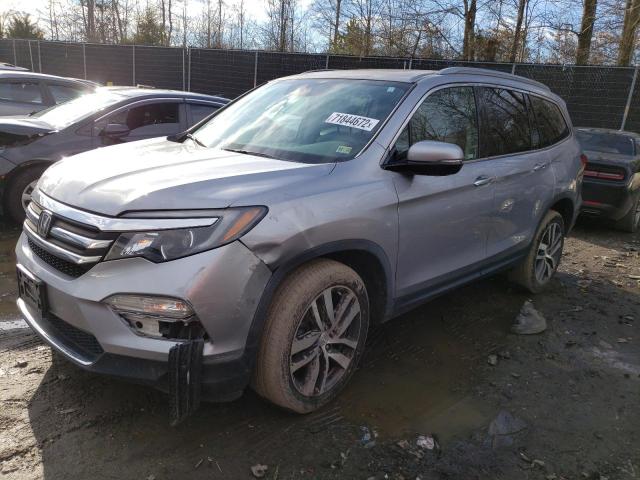 Photo 1 from auction – 2018 HONDA PILOT TOUR with VIN 5FNYF6H97JB013080
