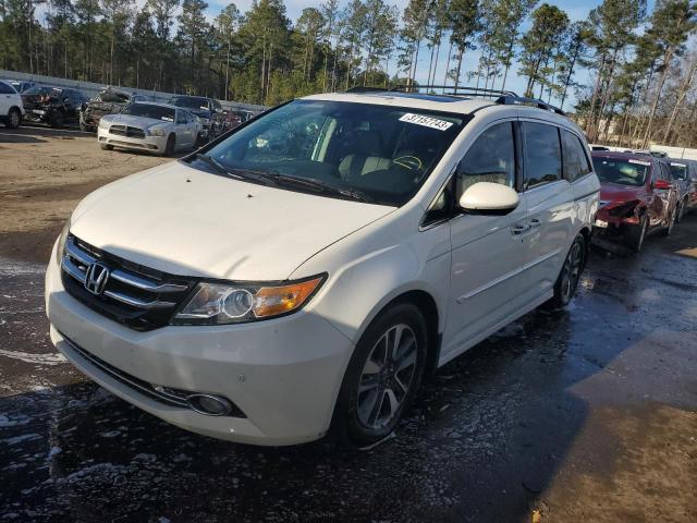 HONDA ODYSSEY TO 2014 with VIN 5FNRL5H92EB032665 - Photo from auction