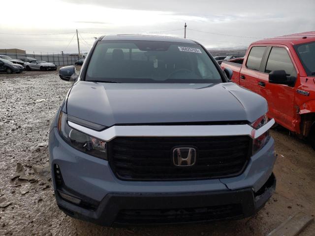 Photo 5 from auction – 2022 HONDA RIDGELINE with VIN 5FPYK3F77NB012584