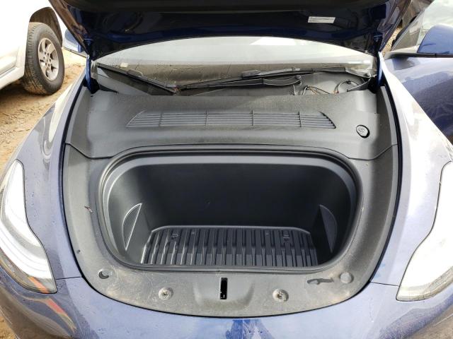 Photo 11 from auction – 2022 TESLA MODEL Y with VIN 7SAYGDEE8NF386009