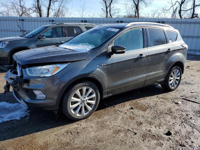 FORD ESCAPE TIT 2017 with VIN 1FMCU9J97HUD63740 - Photo from auction