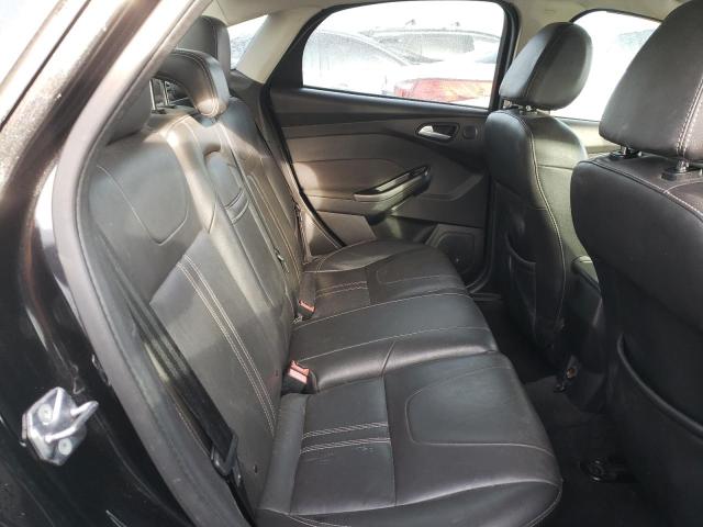 Photo 10 from auction – 2013 FORD FOCUS TITA with VIN 1FADP3J26DL142586