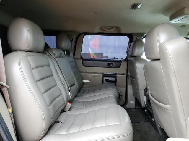 Фото 11 с аукциона – 2004 HUMMER H2 с VIN 5GRGN23U44H102353