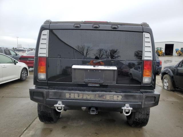 Photo 6 from auction – 2004 HUMMER H2 with VIN 5GRGN23U44H102353