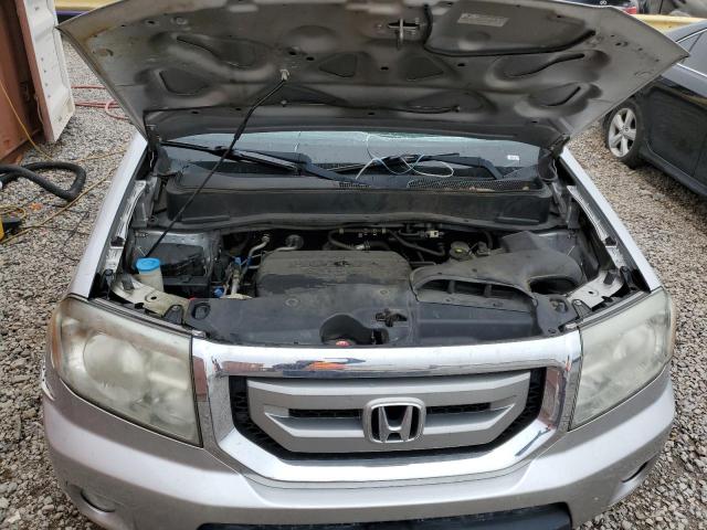Photo 12 from auction – 2011 HONDA PILOT TOUR with VIN 5FNYF3H9XBB045229