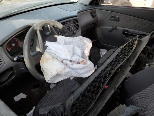 Photo 8 from auction – 2011 KIA RIO BASE with VIN KNADH4A30B6748447