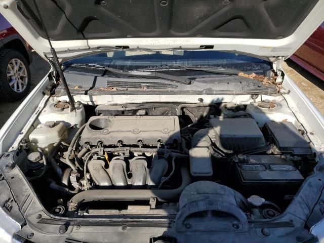 Photo 11 from auction – 2009 KIA OPTIMA LX with VIN KNAGE228X95325492