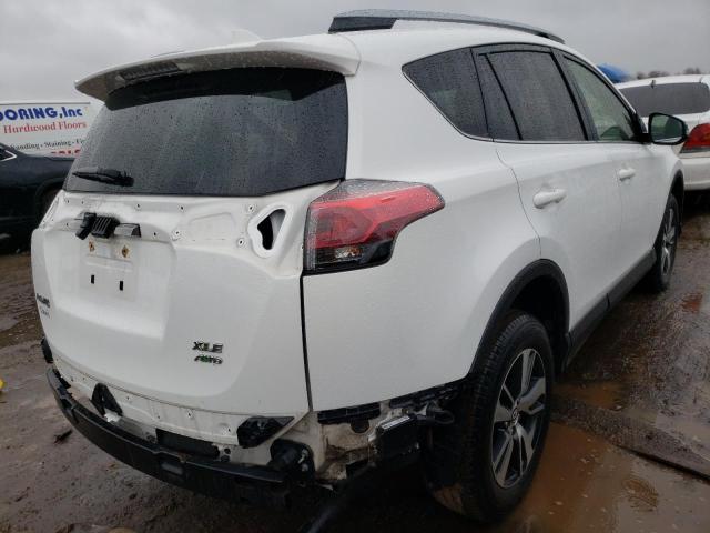 Photo 3 from auction – 2017 TOYOTA RAV4 XLE with VIN JTMRFREV5HD221483