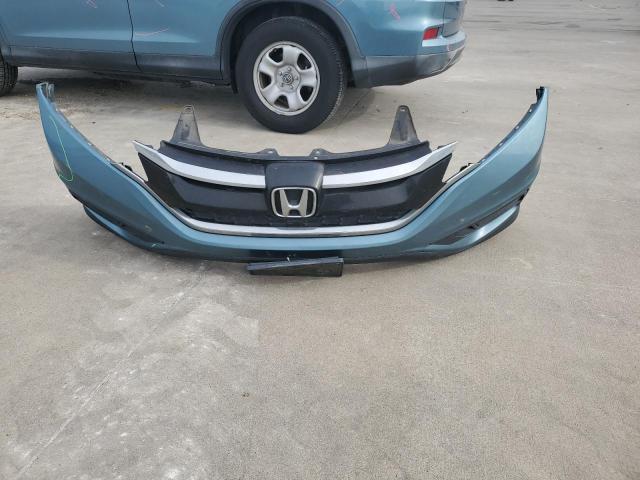 Photo 13 from auction – 2015 HONDA CR-V LX with VIN 2HKRM4H38FH640258