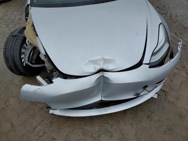 Photo 11 from auction – 2018 TESLA MODEL 3 with VIN 5YJ3E1EB7JF079524