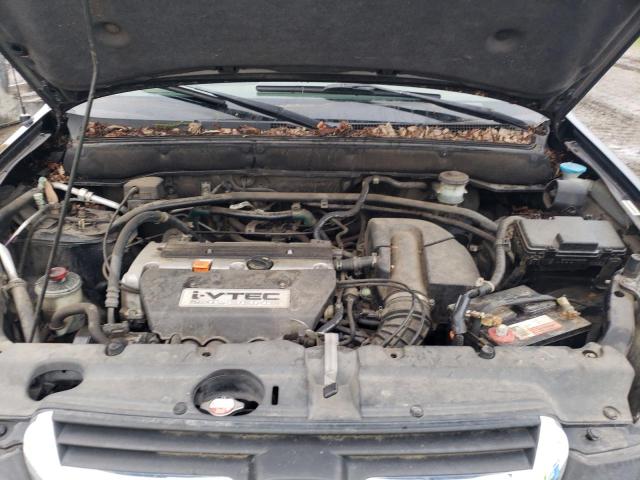 Photo 12 from auction – 2002 HONDA CR-V LX with VIN JHLRD68472C025990