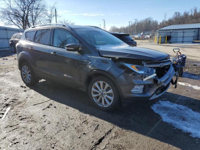 Photo 4 from auction – 2017 FORD ESCAPE TIT with VIN 1FMCU9J97HUD63740