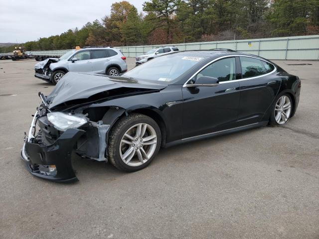 TESLA MODEL S 2013 with VIN 5YJSA1CG4DFP09753 - Photo from auction