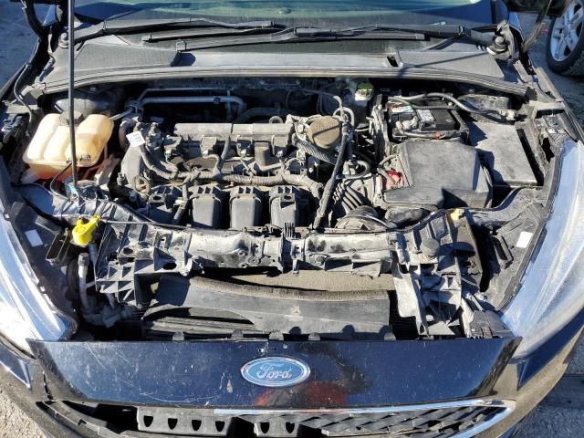 Photo 11 from auction – 2016 FORD FOCUS SE with VIN 1FADP3F20GL205615