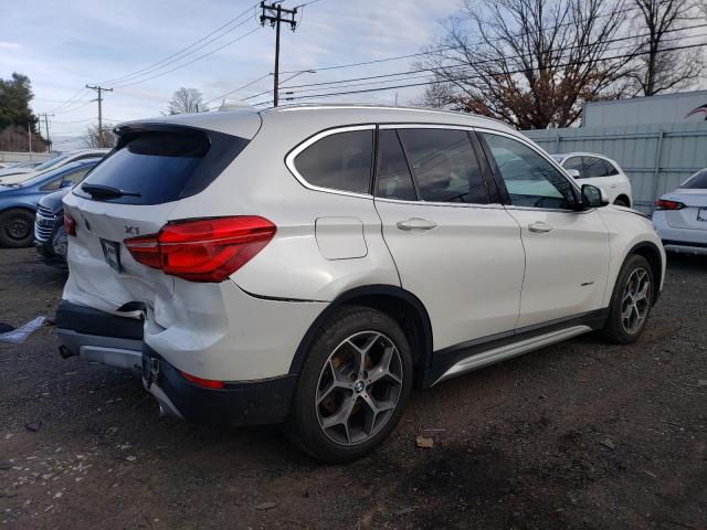 Photo 3 from auction – 2016 BMW X1 XDRIVE2 with VIN WBXHT3C35G5F67406