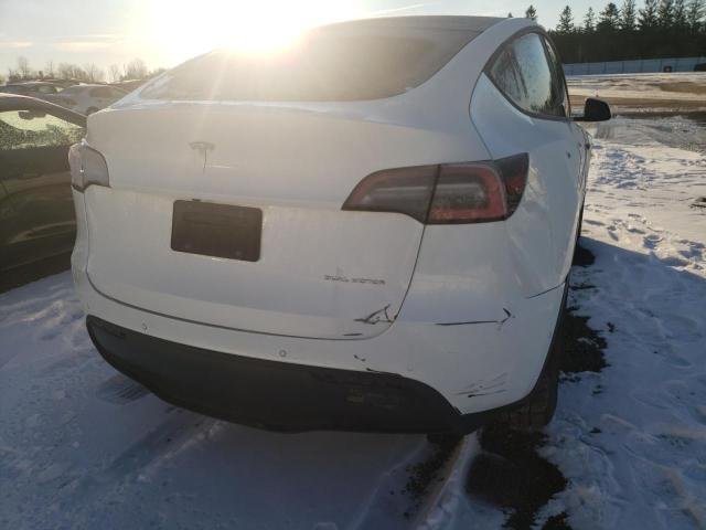 Photo 11 from auction – 2021 TESLA MODEL Y with VIN 5YJYGDEE2MF061741