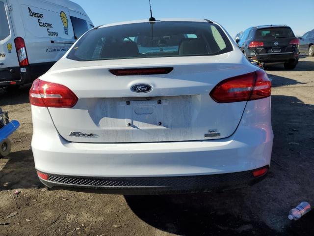 Photo 6 from auction – 2018 FORD FOCUS SE with VIN 1FADP3FE1JL264691